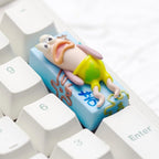 Bikini Bottom tired fish 2U keycap viewed at an angle on a white keyboard