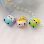 Three colorful budgerigar keycap designs displayed together | SIMPOCUBIC