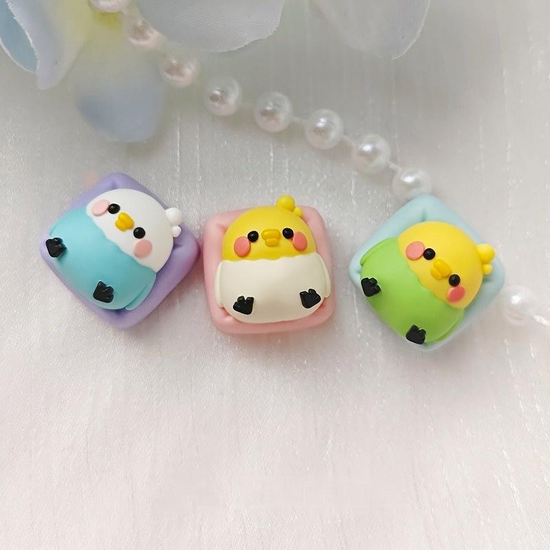 Three colorful budgerigar keycap designs displayed together | SIMPOCUBIC