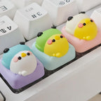 Three budgerigar keycaps arranged on a keyboard | SIMPOCUBIC