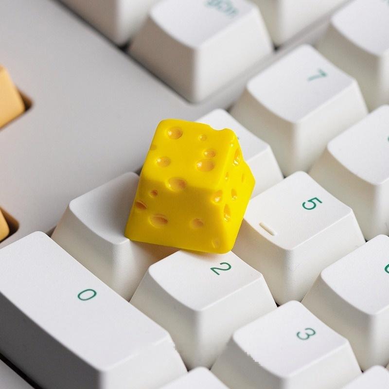 Yellow cheese keycap fitted on a white keyboard | SIMPOCUBIC
