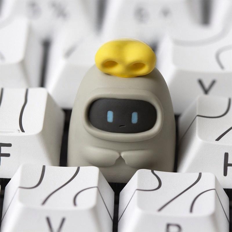 Original Clockwork Momo single keycap on a white keyboard