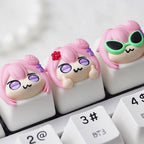 Three Doro expression keycaps fitted on a white keyboard | SIMPOCUBIC