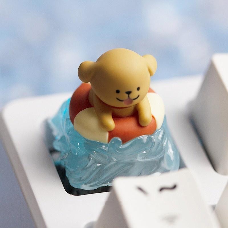 Yellow swim-ring puppy keycap fitted on a white keyboard | SIMPOCUBIC