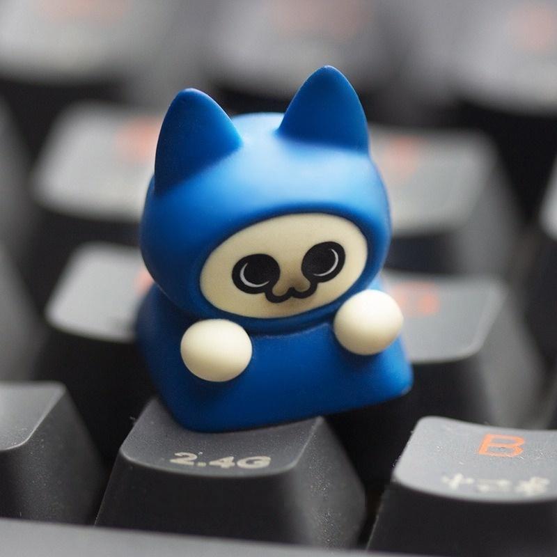 Blue Monster Hunter cat keycap on a black keyboard | SIMPOCUBIC