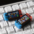 Two Nintendo Switch console keycap designs displayed on a white keyboard | SIMPOCUBIC