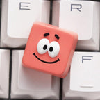 Patrick Star character single keycap on a white keyboard