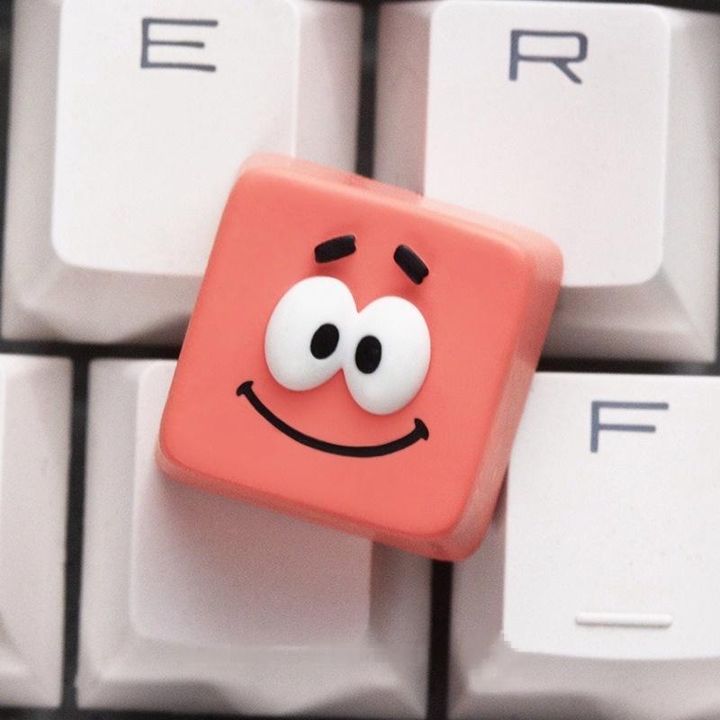 Patrick Star character single keycap on a white keyboard