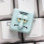 Squidward character single keycap on a white keyboard