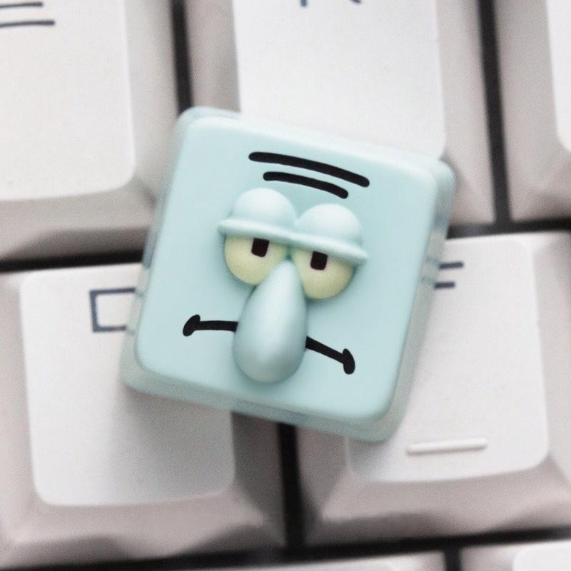 Squidward character single keycap on a white keyboard