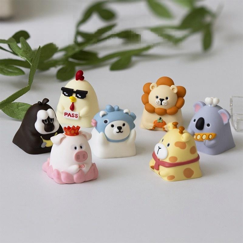 Seven animal keycap designs displayed together | SIMPOCUBIC
